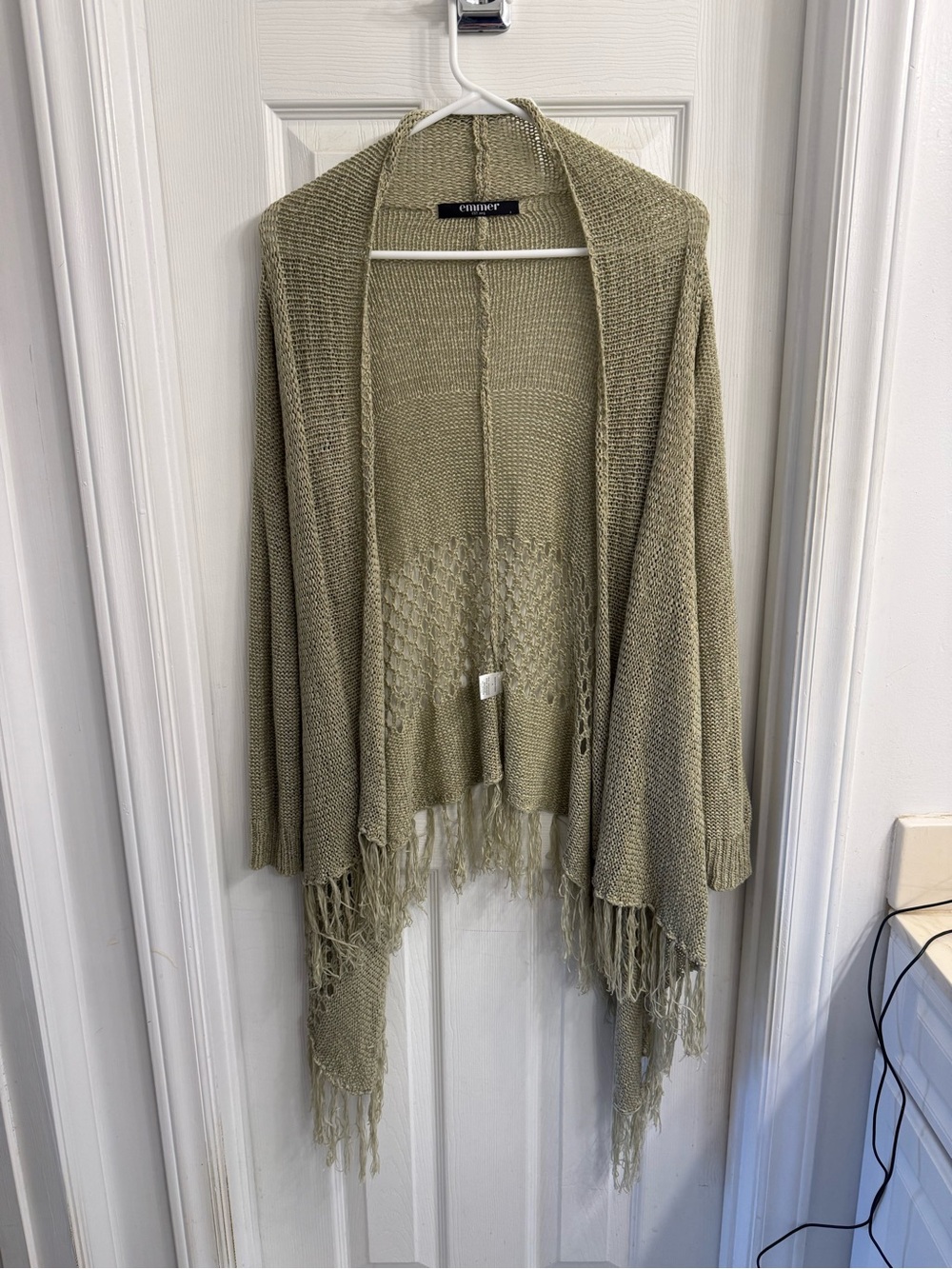 Emmer open-front cardigan with fringed hem.